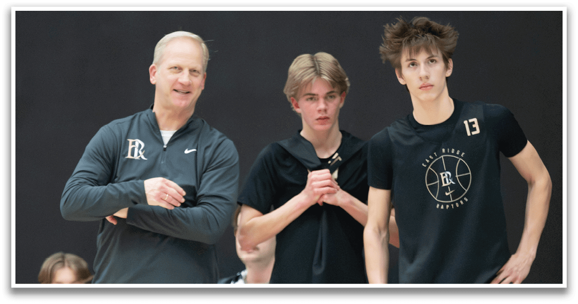 Three men wearing black and gold basketball uniforms are standing on the court, watching a game. AI generated content