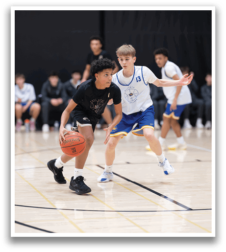 Two boys playing basketball, one with a basketball in his hand and the other with his hand out. AI generated content