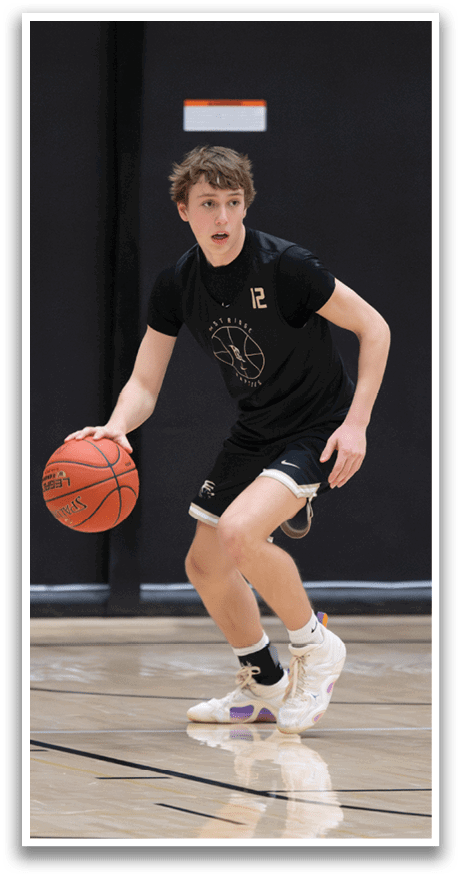 A young man is holding a basketball in a gym. AI generated content