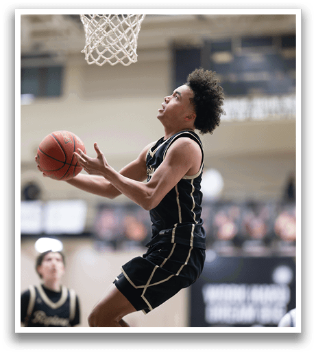 A basketball player leaps into the air to catch a basketball. AI generated content
