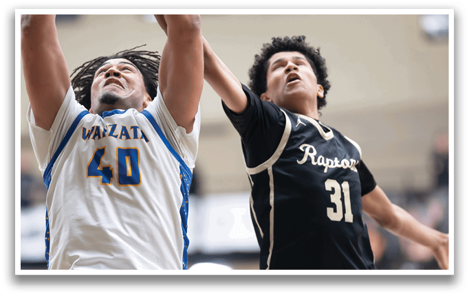 Two basketball players are playing in a game. One player is wearing a blue jersey and is attempting to shoot the ball. The other player is trying to block the shot. AI generated content
