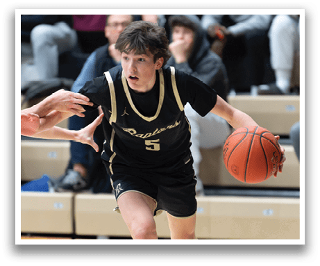 A basketball player wearing a black and gold jersey is running with a basketball in his hands. AI generated content