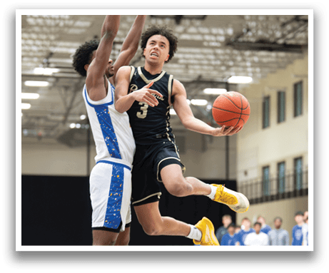 Two basketball players are leaping in the air, one holding a basketball. AI generated content