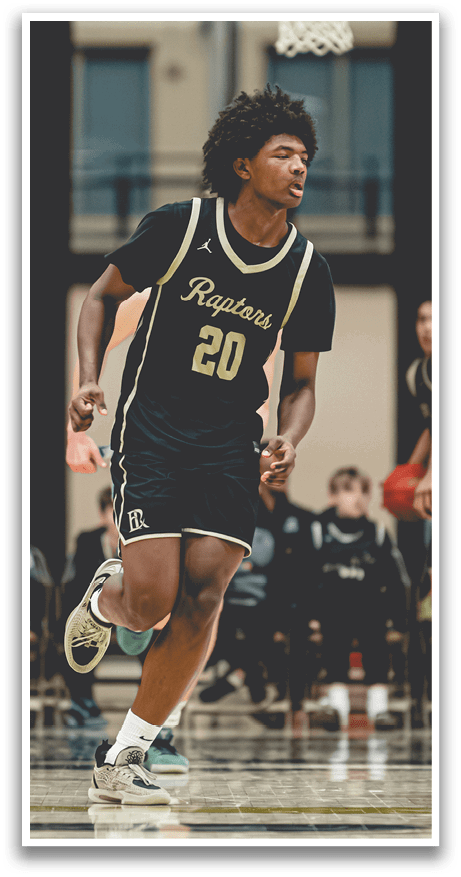 A basketball player wearing a black and gold jersey with the number 20 on it is running on the court. AI generated content