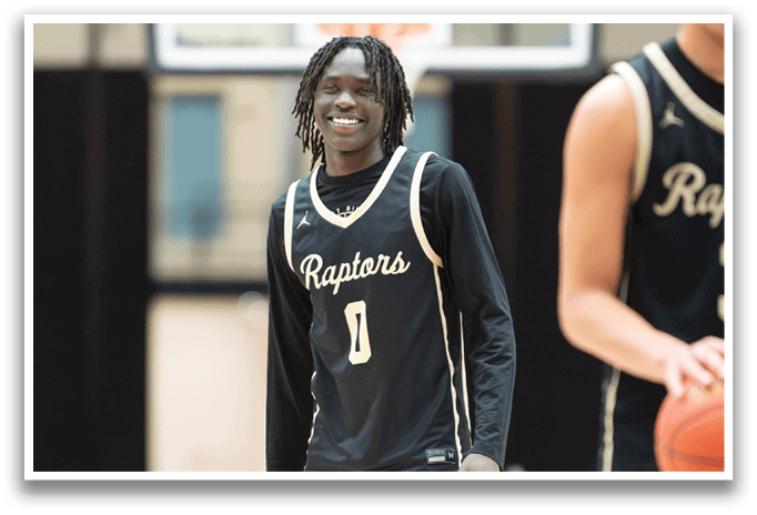A basketball player wearing a black and gold jersey with the number 1 on it. AI generated content