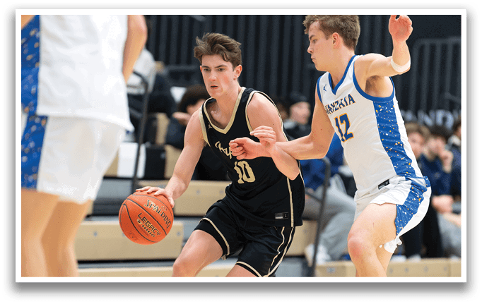 Two basketball players are playing on a court, one holding a basketball and the other trying to block him. AI generated content