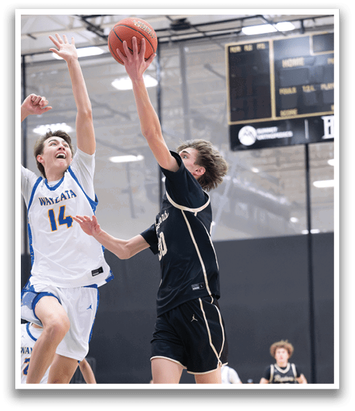 Two basketball players jumping for a rebound, one wearing a black jersey and the other wearing a white jersey. AI generated content