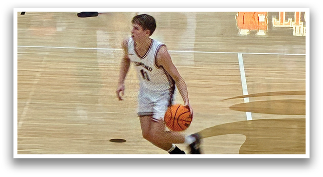 A basketball player is holding a basketball on the court. AI generated content