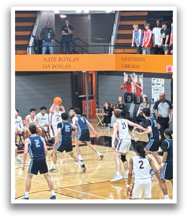 A group of people playing basketball on a court. AI generated content