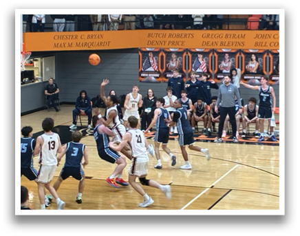 Basketball game in progress with players on the court and a crowd watching. AI generated content