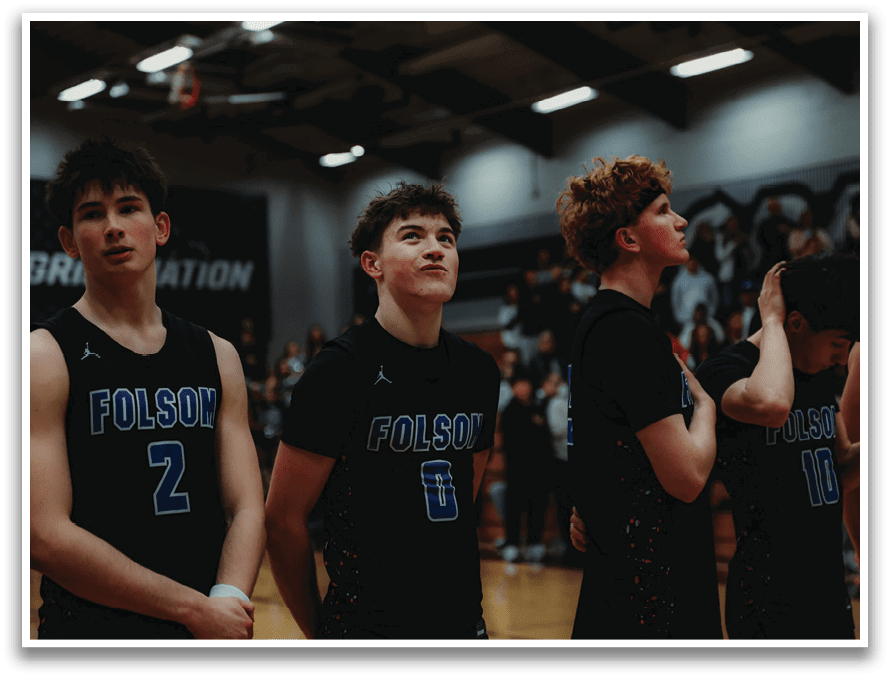 A group of young men wearing black jerseys with the word “Folsom" on them. AI generated content