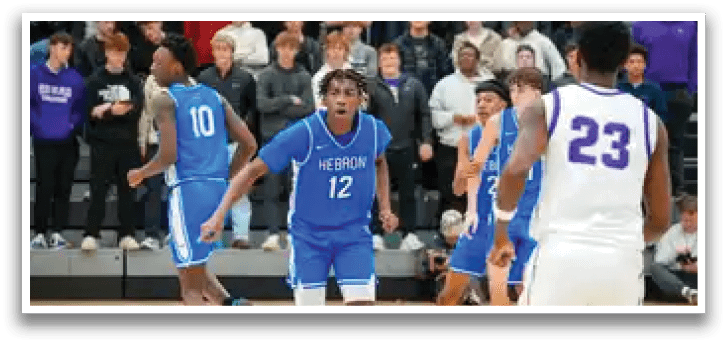 Basketball players on a court with a crowd watching. AI generated content