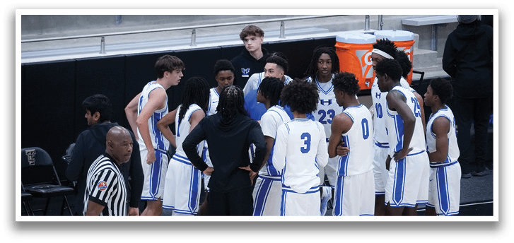 A group of basketball players are lined up on the court, wearing blue and black uniforms. AI generated content