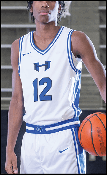 A young man wearing a basketball uniform holds a basketball. AI generated content