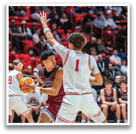 Two basketball players are on the court, one of them wearing a red jersey. They are both trying to reach for the basketball. AI generated content