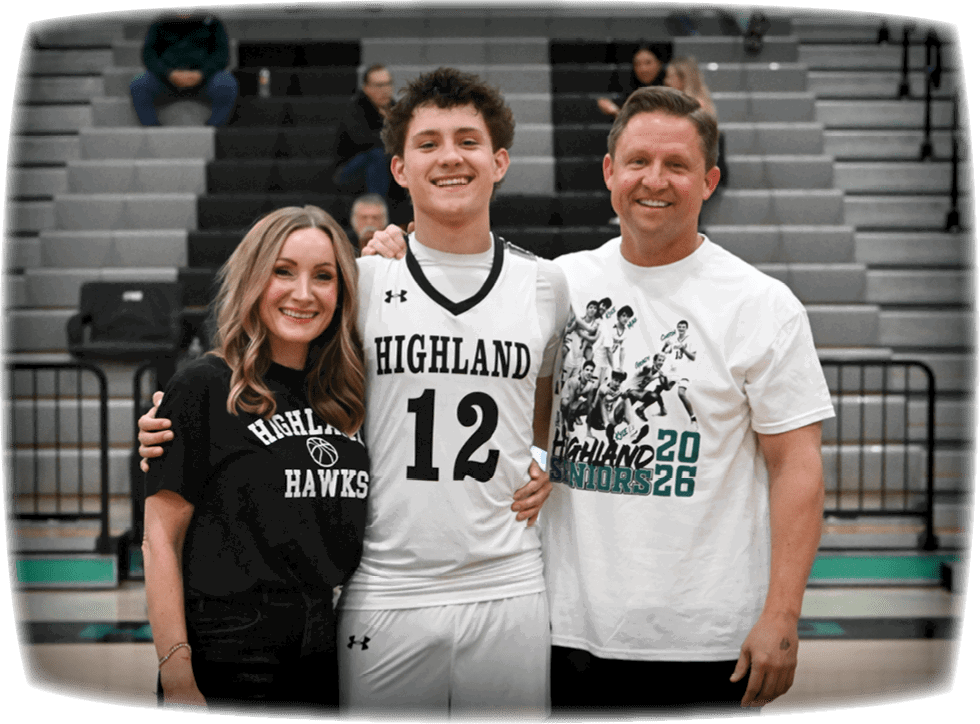 A man, woman, and boy pose for a photo on a basketball court. The boy is wearing a basketball uniform with the number 12. AI generated content