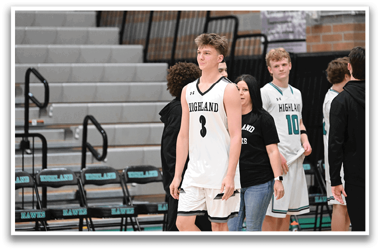 A group of people, including a man wearing a basketball jersey, are walking down a hallway. AI generated content