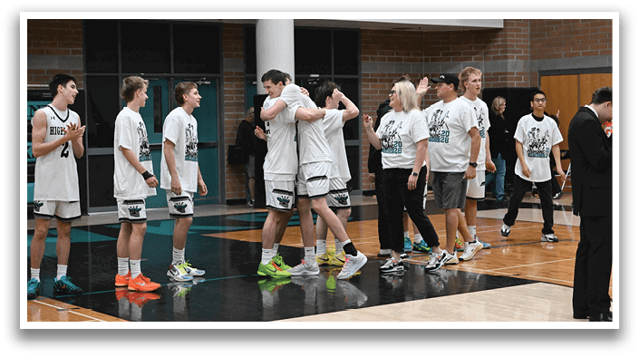 A group of young men and women are standing on a basketball court, hugging and congratulating each other. AI generated content