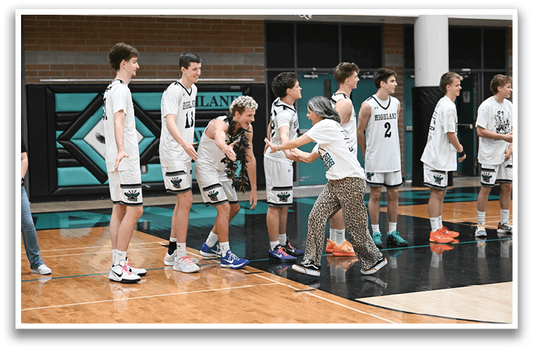 A group of young men and women are standing on a basketball court. AI generated content