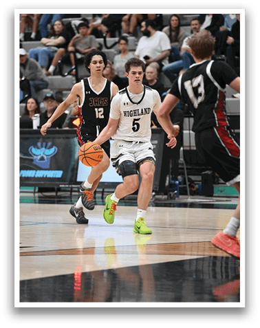 A group of men playing basketball on a court. One player is holding a basketball. AI generated content
