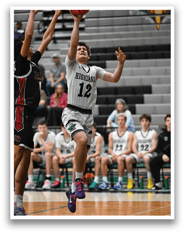 A basketball player jumps in the air to grab the ball. AI generated content