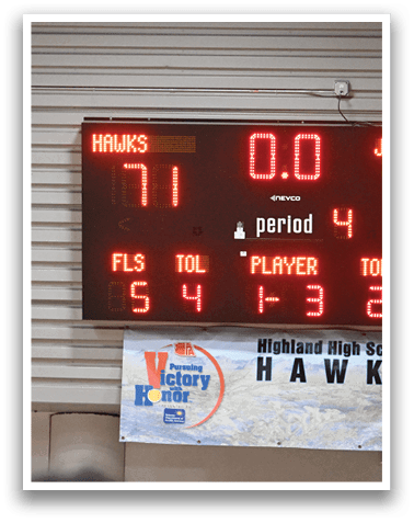 A scoreboard shows the score of a volleyball game between the Hawks and the Jaguars. AI generated content