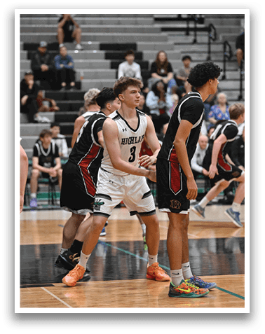 A group of young men playing basketball on a court. AI generated content
