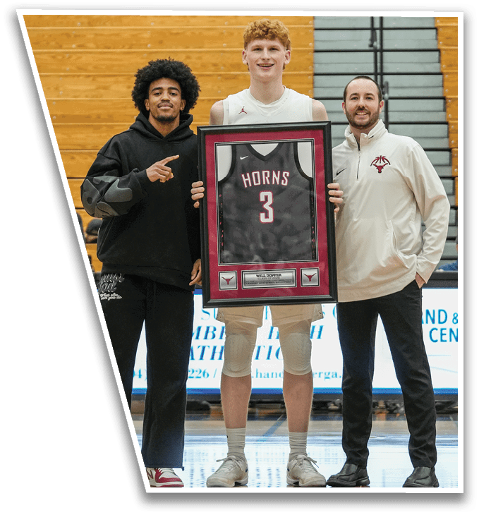 Two men are standing on a basketball court, one holding a framed jersey. AI generated content