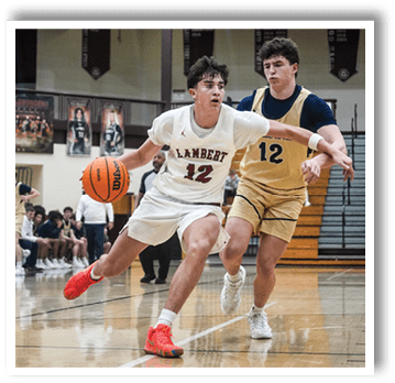 Two basketball players on a court, one with the number 12 on his shirt. AI generated content