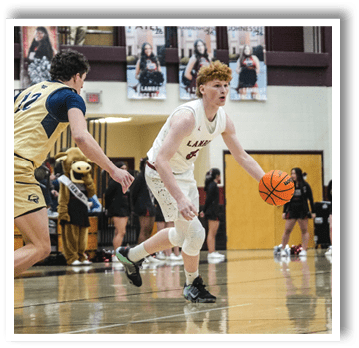 Two basketball players on a court, one with a basketball and the other with a basketball in his hand. AI generated content