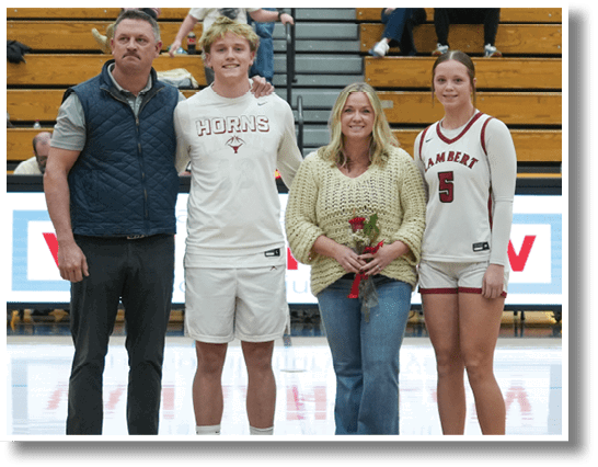 A group of people pose for a photo on a basketball court. AI generated content