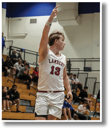 A basketball player wearing a white uniform and red shorts is celebrating a point. AI generated content