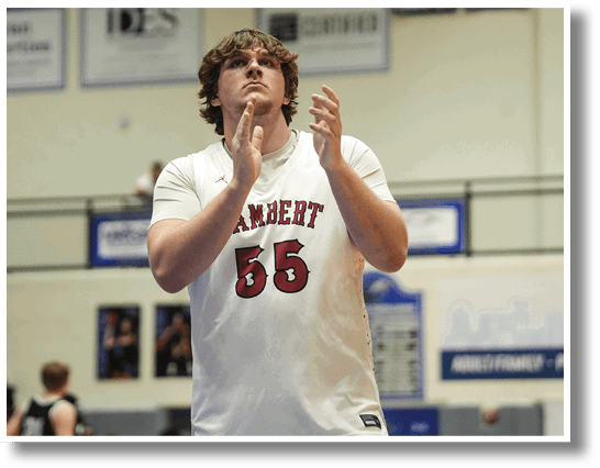 A man wearing a white jersey with the number 56 on it is standing on a basketball court. AI generated content