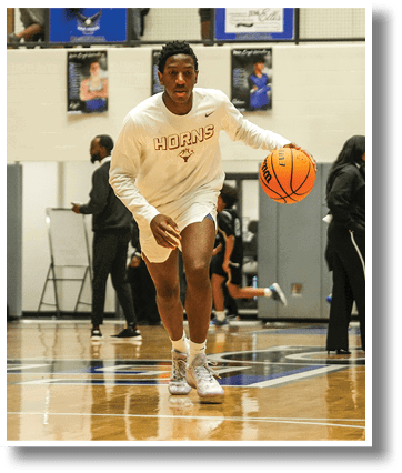 A basketball player in a white shirt and red shorts is holding a basketball on a court. AI generated content