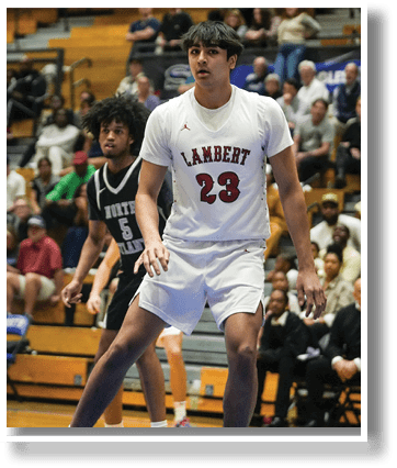 A basketball player wearing a white uniform stands on the court, ready to play. AI generated content
