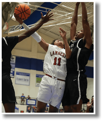 Three basketball players are in the middle of a game, with one player attempting to block a shot. AI generated content