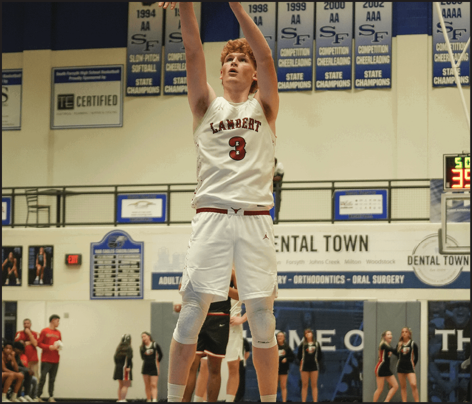 A basketball player in a red jersey is holding the ball, ready to shoot. AI generated content