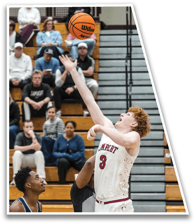 A basketball player leaps in the air to block a shot, while a crowd of people watch from the stands. AI generated content