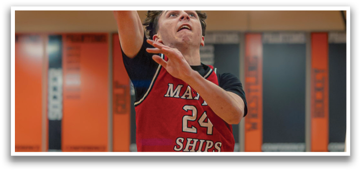 A basketball player is in the air, attempting to dunk the ball. AI generated content