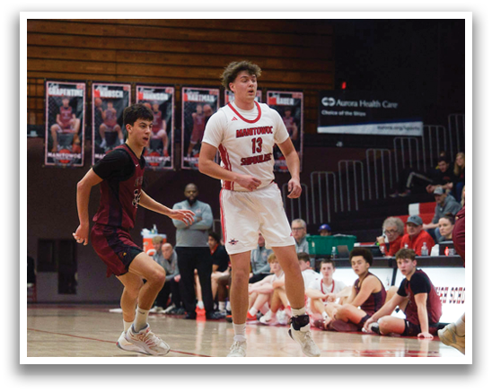 A group of young men playing basketball on a court. AI generated content