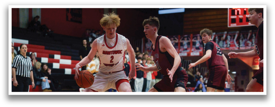 A group of young men playing basketball on a court. AI generated content