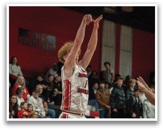 A basketball player is jumping to shoot the ball, while a crowd of people watches. AI generated content