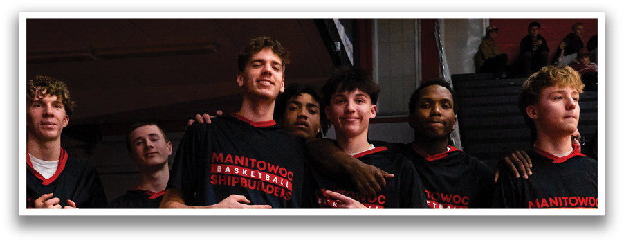 A group of men wearing black and red striped pants pose for a picture. AI generated content