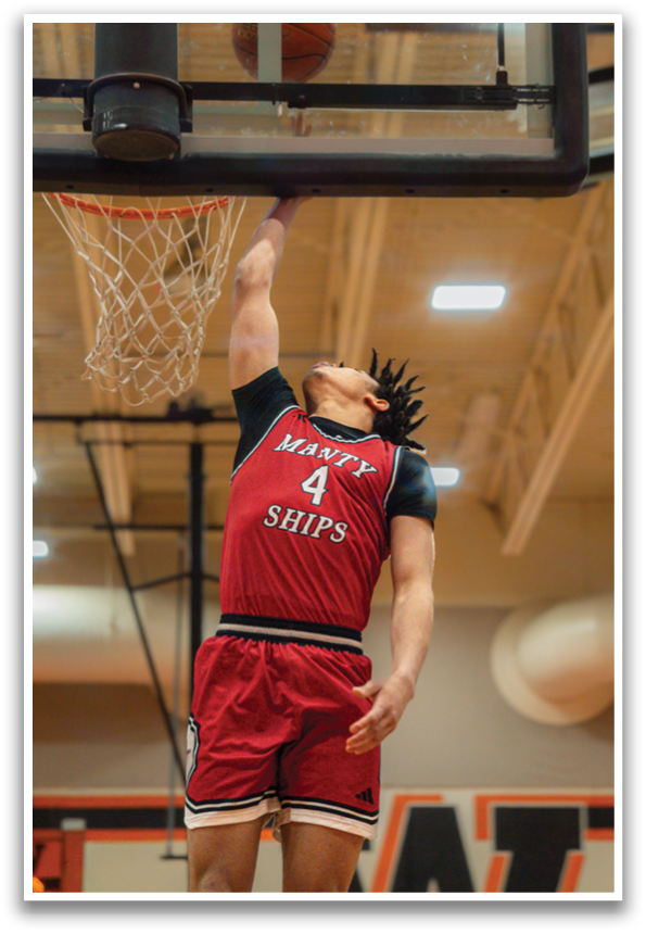 A basketball player wearing a red jersey with the number 4 on it is jumping to hit a basketball in the air. AI generated content
