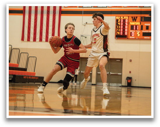 Two boys playing basketball on a court. AI generated content