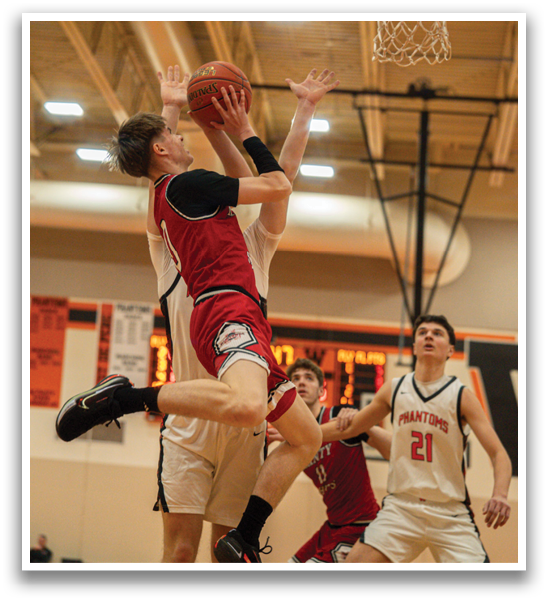A basketball player leaps in the air to block a shot, while other players watch and prepare to react. AI generated content