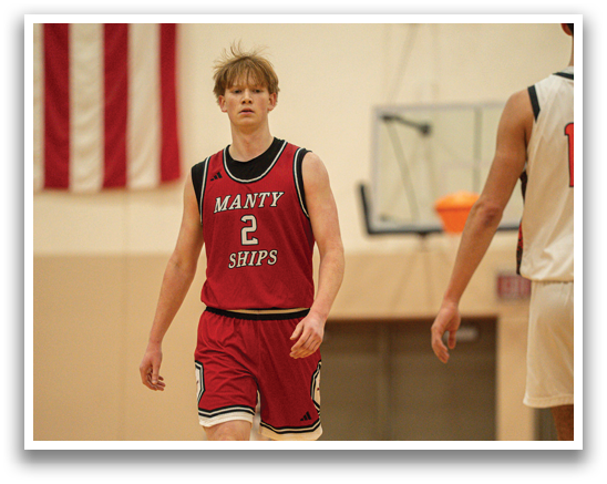 Two basketball players on the court, one wearing a red jersey with the number 2. AI generated content