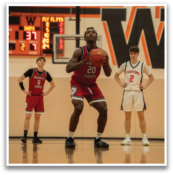 A basketball player in a red jersey is holding a basketball, while two other players watch. AI generated content