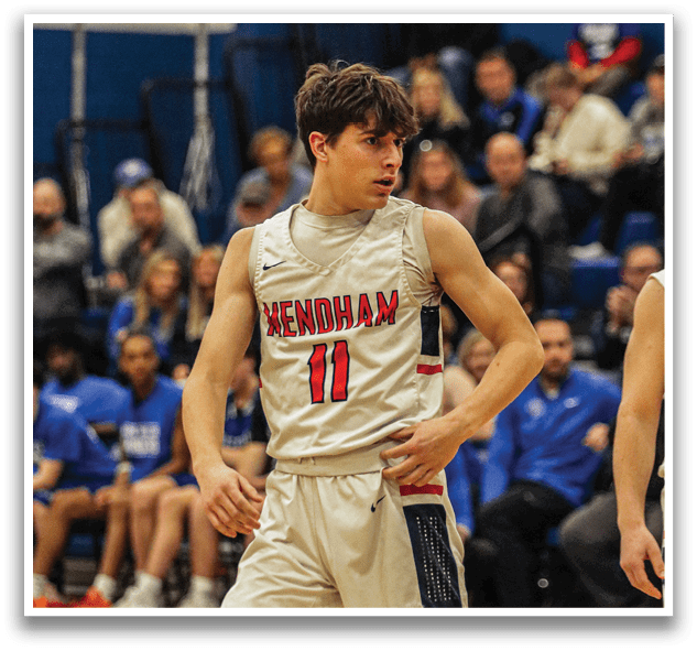 A basketball player wearing a number 11 jersey stands on the court. AI generated content