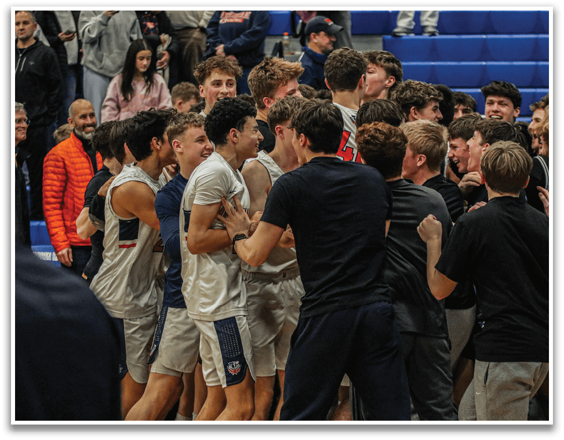 A group of people hugging each other on a basketball court. AI generated content